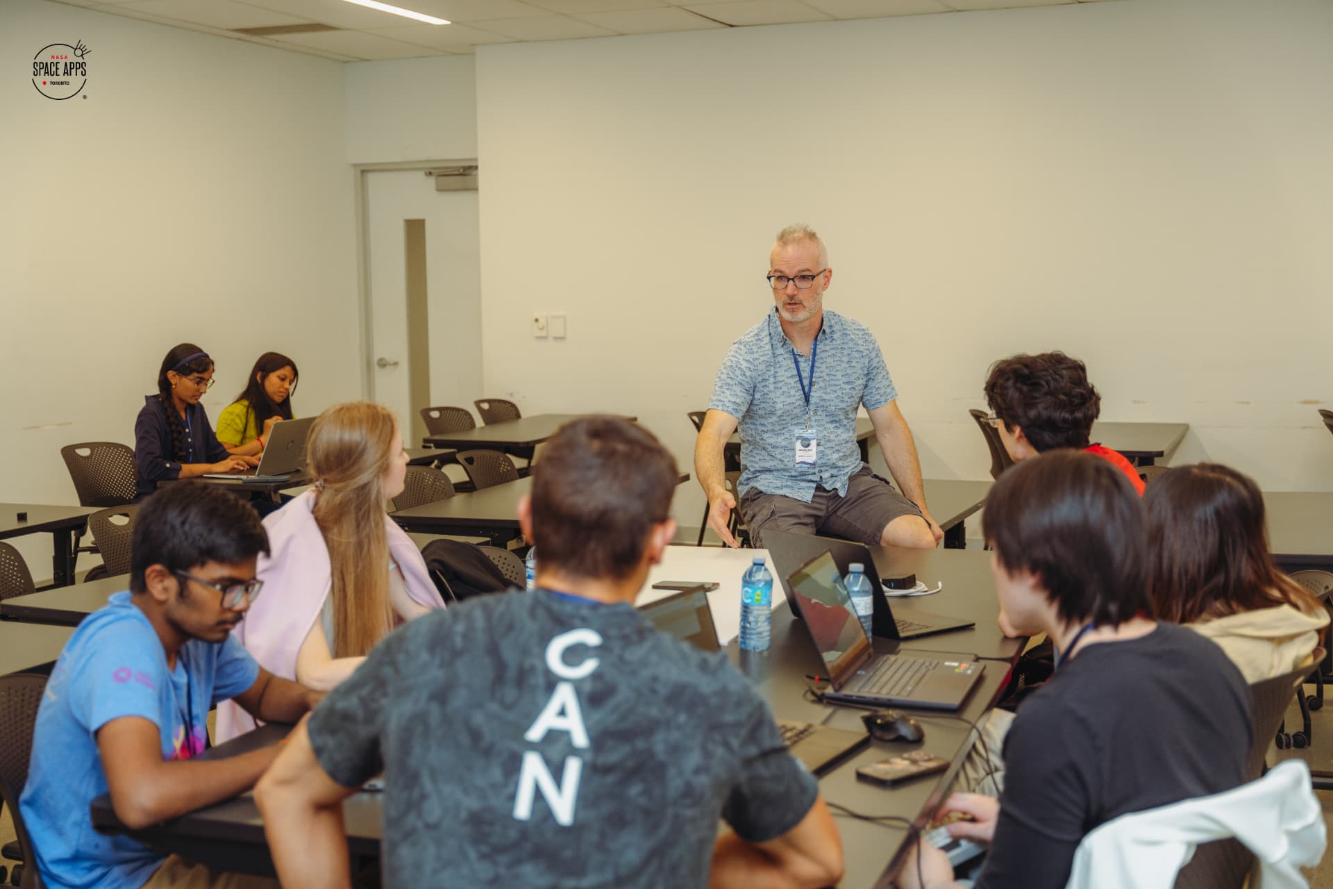 NASA Space Apps Toronto 2025 mentor guiding a team of participants